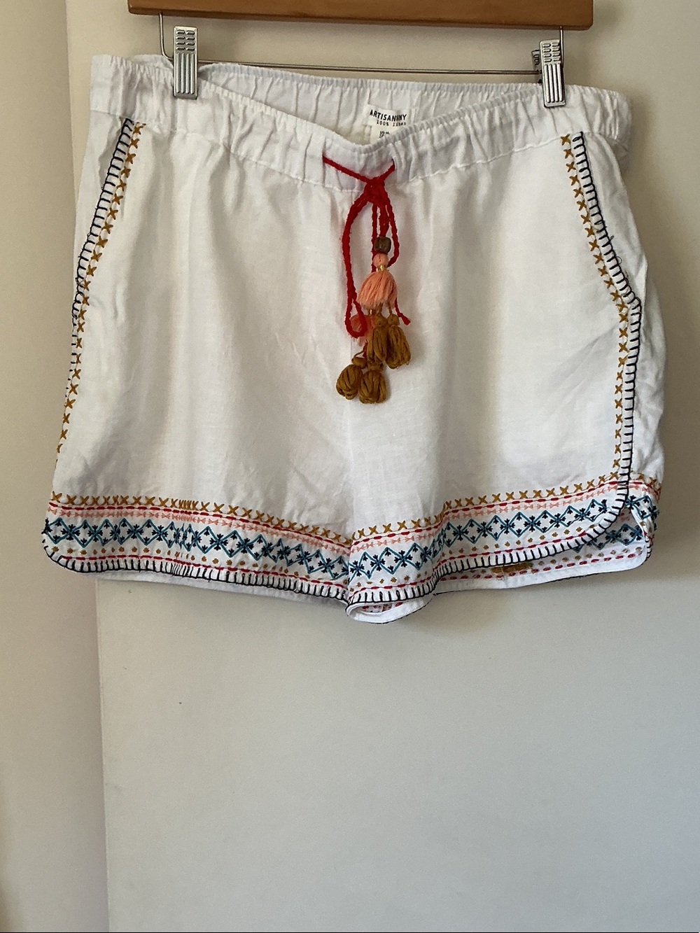 Artisan White High Waist Embroidered Linen-Blend Shorts with Red Tassels